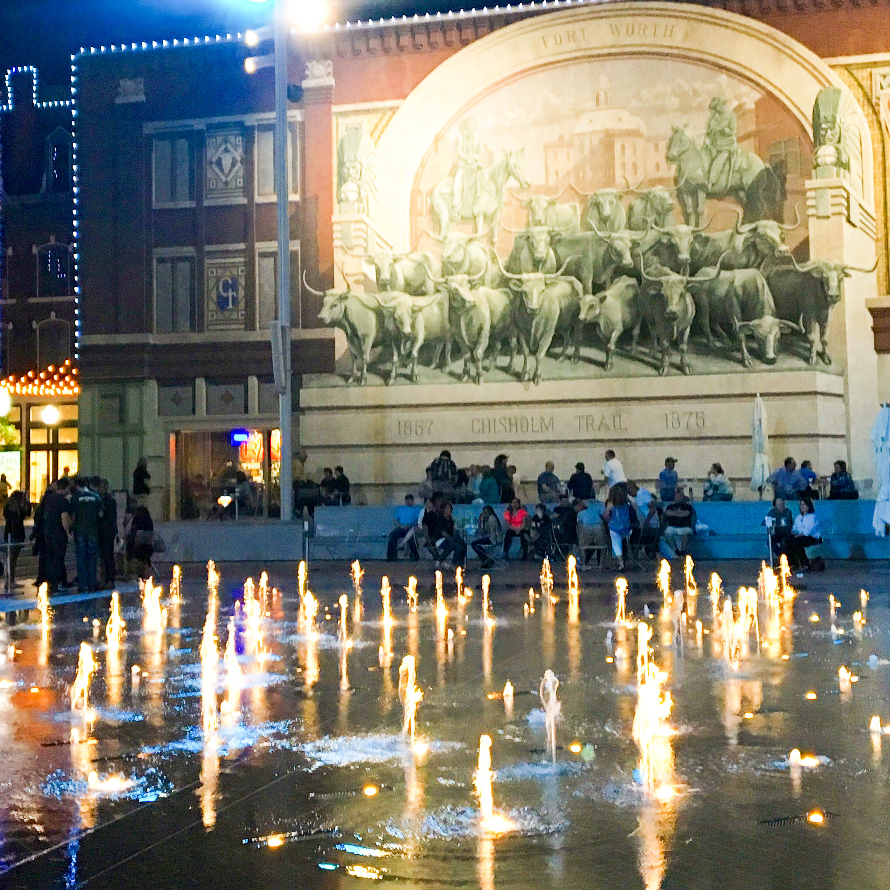 Fort Worth's Sundance Square at night when staying the weekend for the DFW Writers' Conference